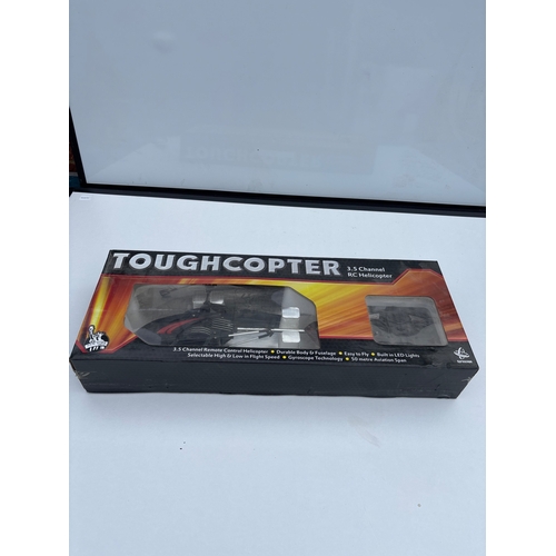 273 - Toughcopter remote-controlled helicopter in original packaging, unopened.