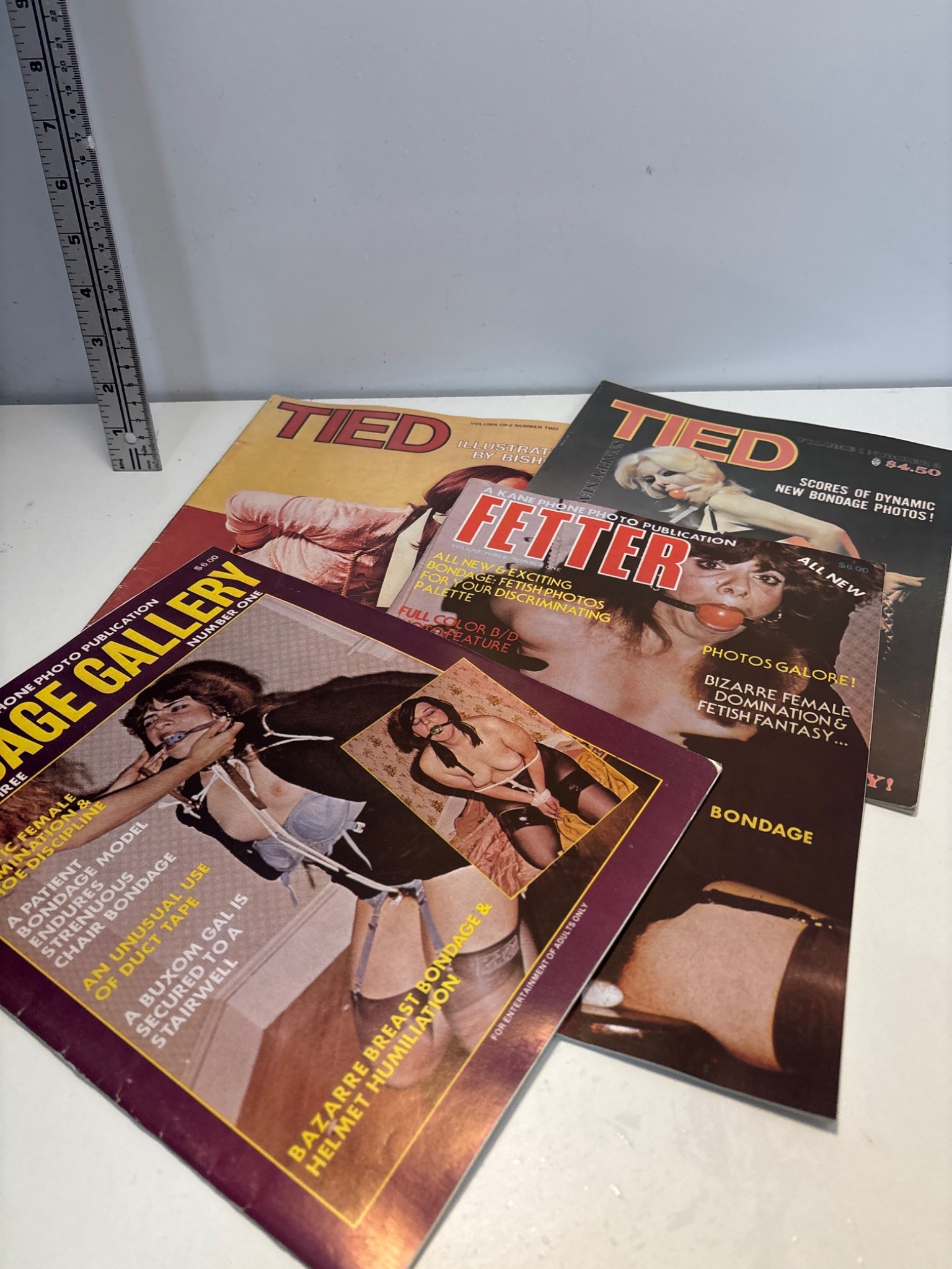 1970 bondage magazines including titles like Tied and Fetter, featuring ...