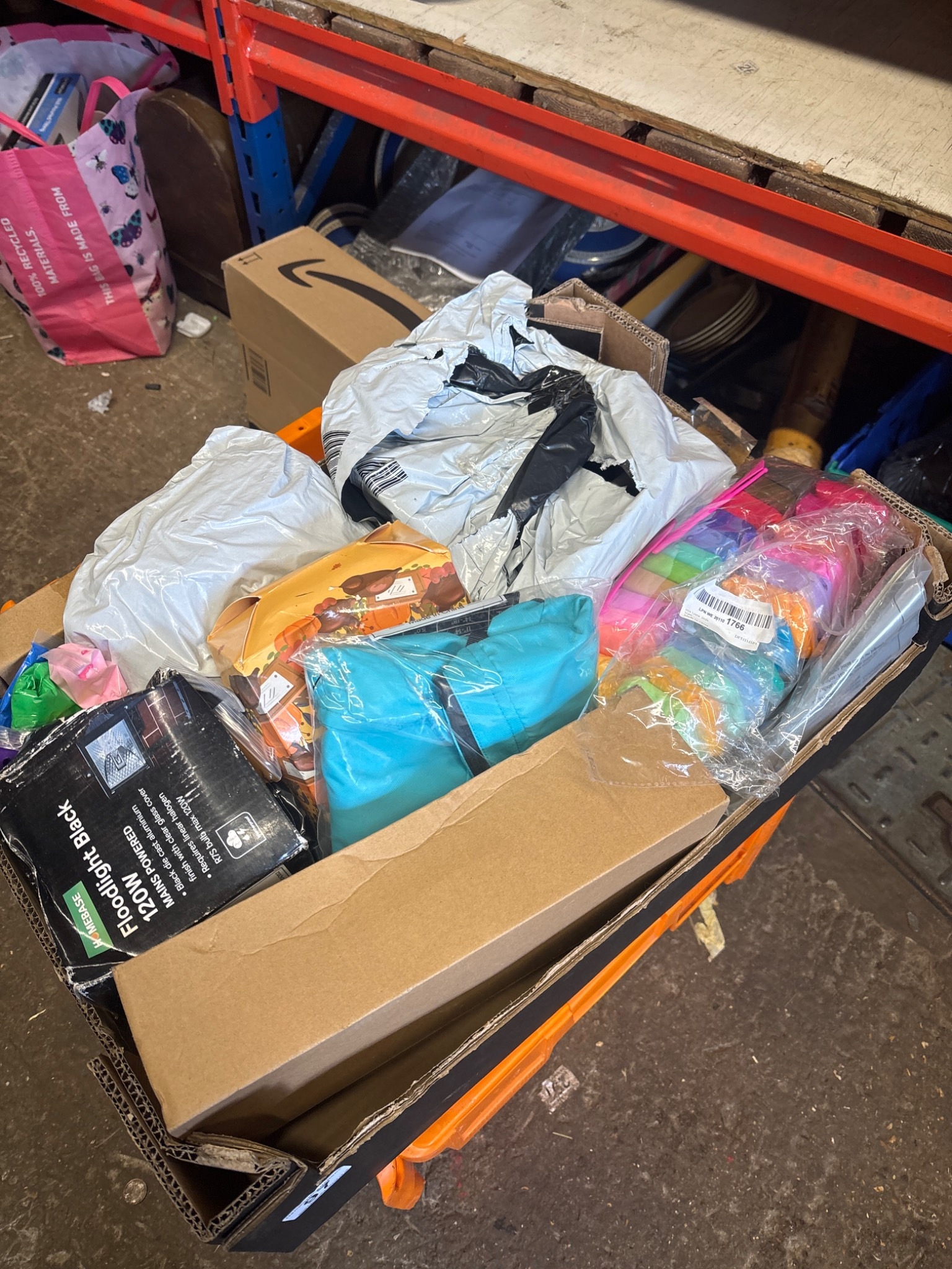 Various items including toys, bags, and miscellaneous goods in used ...