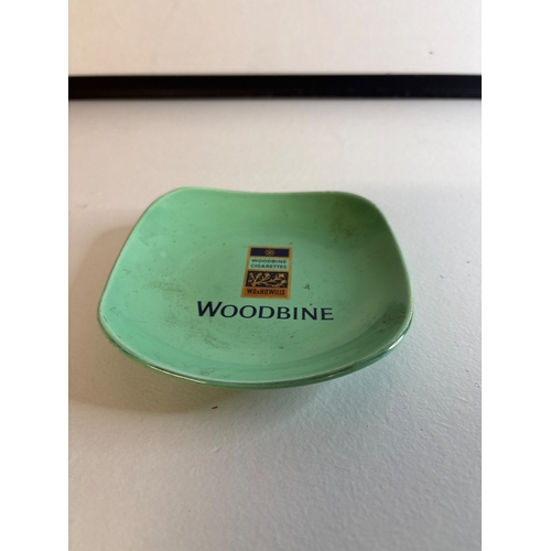 15 - Green ceramic ashtray with Woodbine logo.