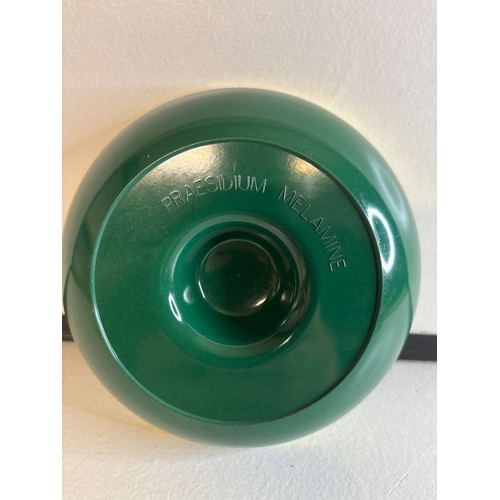 16 - Green Presidium melamine swan vester ash tray with yellow trim and logos.