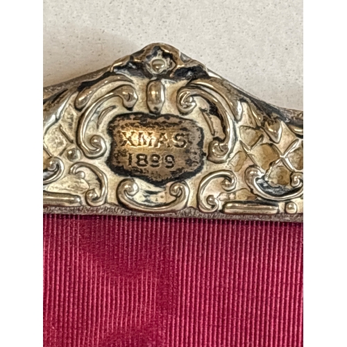 21 - Ornate silver frame with 'Xmas 1889' engraved.