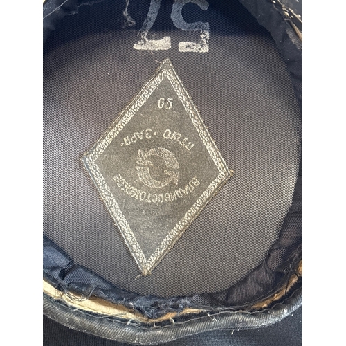 22 - Russian military peaked cap with badge and interior mark.