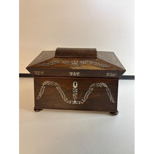 29 - Wooden tea caddy with inlay design and two compartments.
