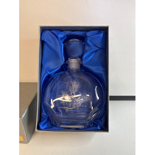 32 - Clear cut crystal decanter with floral etching.