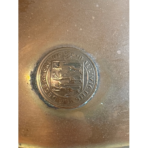 44 - Copper pitcher with embossed crest and handle.