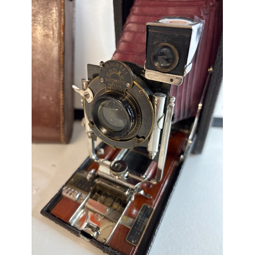48 - Kodak Automatic folding camera with leather case.
