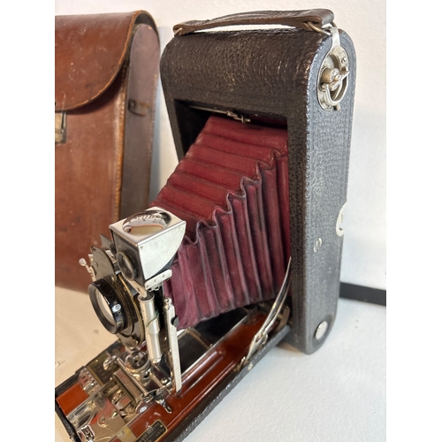 48 - Kodak Automatic folding camera with leather case.