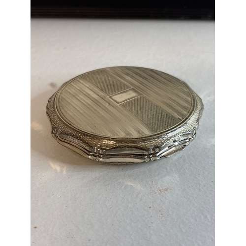 49 - Sterling silver compact case with engraved detail total weight 91 grams