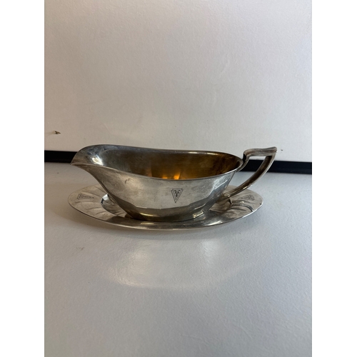 5 - silver plated  gravy boat with attached drip tray.