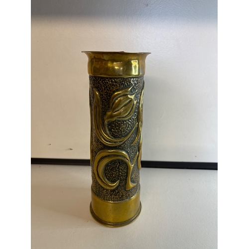 51 - Trench chart,brass artillery shell with embossed floral patterns, dated 1910