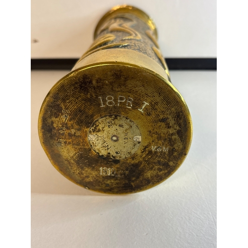 51 - Trench chart,brass artillery shell with embossed floral patterns, dated 1910