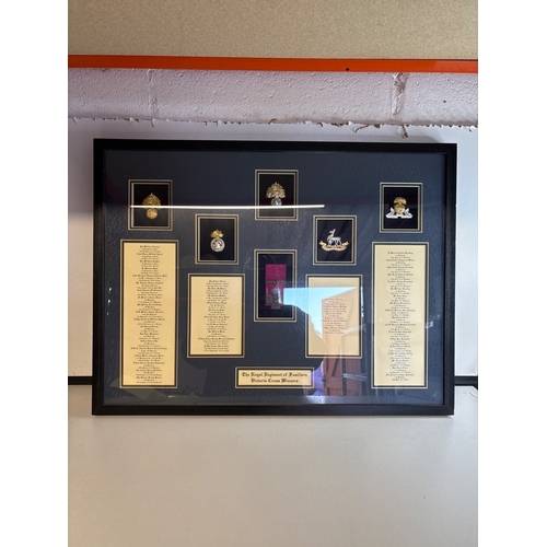55 - Framed replica display featuring Royal Regiment VC insignia and names not postable.