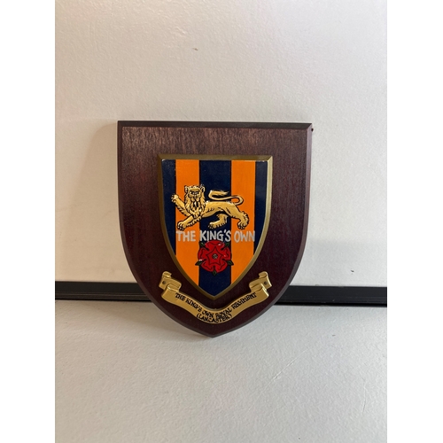 59 - Wooden shield plaque for The King's Own.