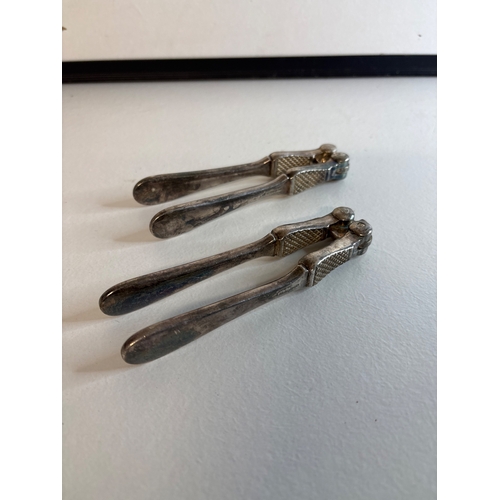 8 - Walker Hall silverplate nutcrackers, textured handles.