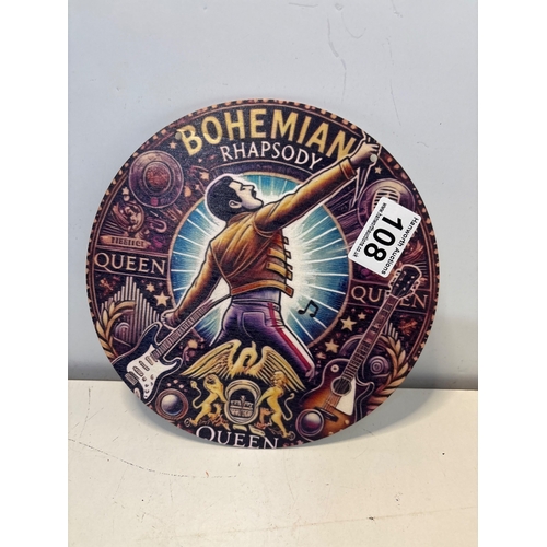 108 - Round decorative Bohemian Rhapsody Queen plate, featuring music-themed artwork.