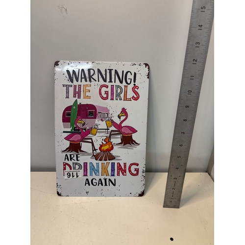 116 - Painted metal sign with humorous text design.