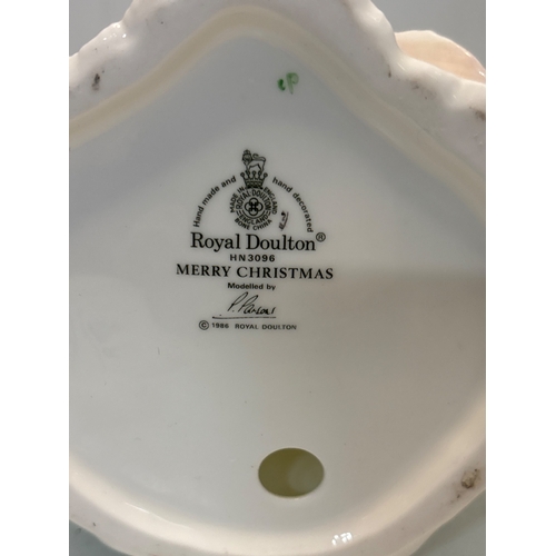 74 - Royal Doulton HN 3096 Merry Christmas figurine.