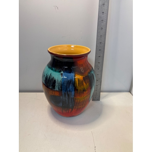 77 - Poole Pottery vase with vibrant glaze, marked England.