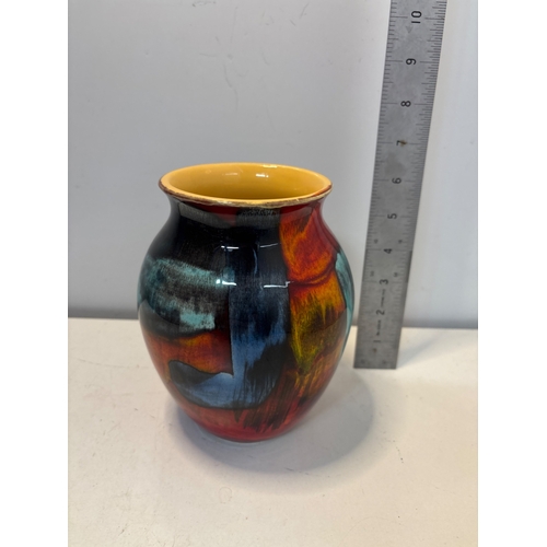 79 - Poole Pottery ceramic vase with multicolor glaze, stamped.