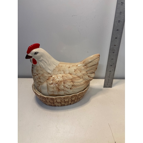 80 - Ceramic hen-shaped dish with lid, beige and brown tones.