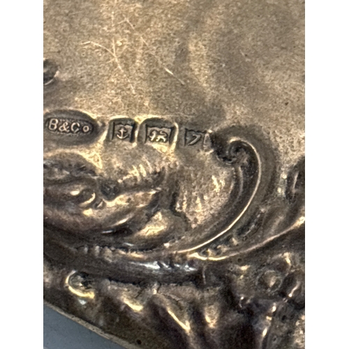 82 - Sterling silver vanity set with mirror and brushes.