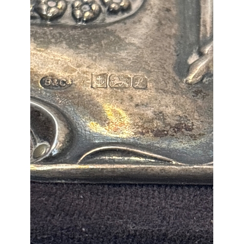 83 - Sterling silver photo frame with hallmarks, 7-inch size.