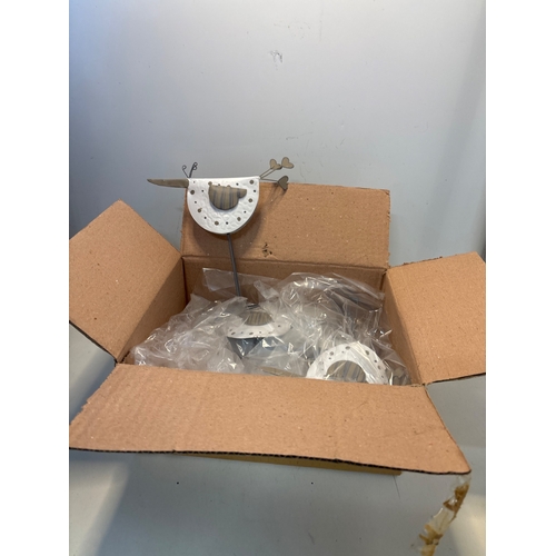 91 - 6 Metal bird sculptures with white details, boxed.