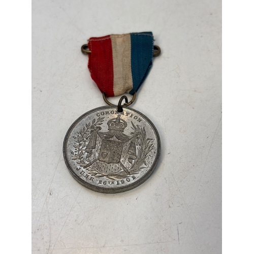 104 - King Edward VII and Queen Alexandra coronation medal, 1902.