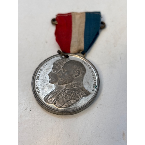 104 - King Edward VII and Queen Alexandra coronation medal, 1902.