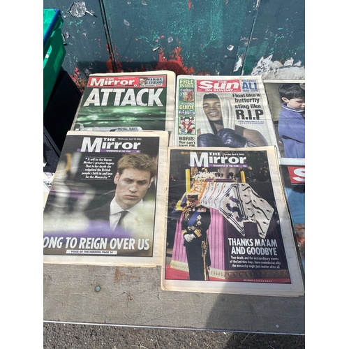 16 - UK tabloid newspapers covering events.