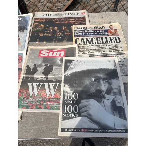 16 - UK tabloid newspapers covering events.