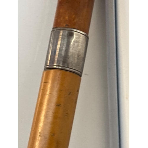 36 - Wooden cane with silver  collar and curved handle not postable.