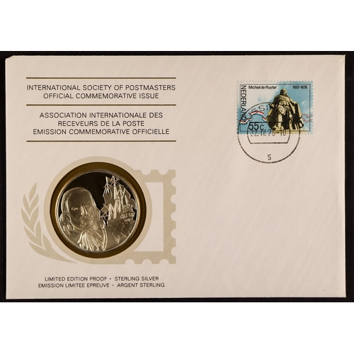 26 - SILVER MEDALLIONS 1975-80 INTERNATIONAL SOCIETY OF POSTMASTERS COVERS in an album (each 20g, 0.925),... 