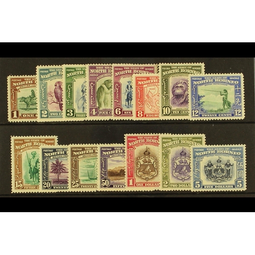 354 - NORTH BORNEO 1939 Pictorial set, SG 303/17, fine mint. Cat. £1400. (15 stamps)