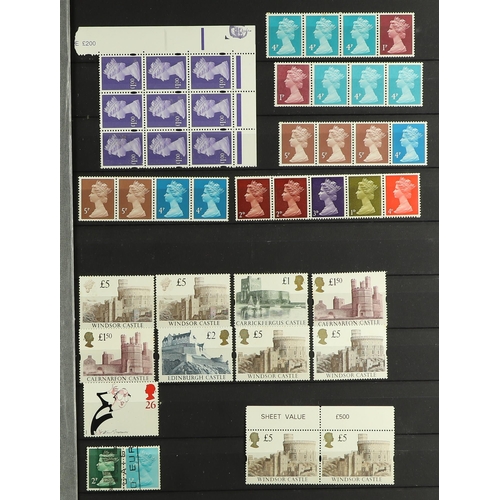 667 - GB.ELIZABETH II 1971 - 2019 MINT HOARD. A bit of everything in 2 stockbooks. Includes single stamps,... 