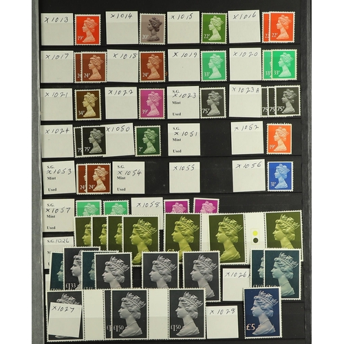 667 - GB.ELIZABETH II 1971 - 2019 MINT HOARD. A bit of everything in 2 stockbooks. Includes single stamps,... 