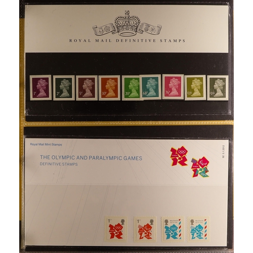 703 - GB.ELIZABETH II MACHIN & REGIONAL PRESENTATION PACKS collection in two Royal Mail albums, with value... 