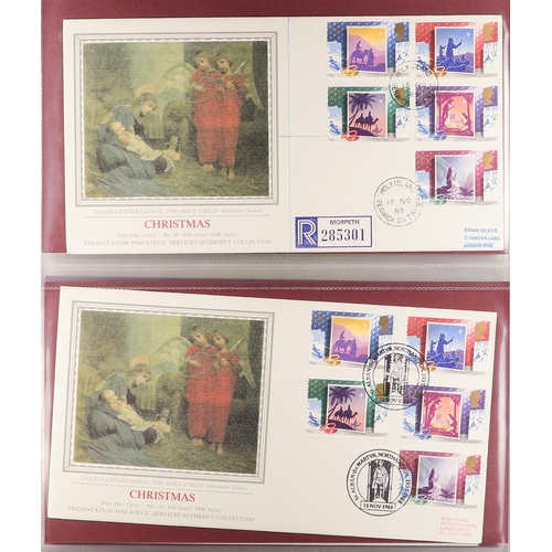 749 - GB.FIRST DAY COVERS PRESENTATION PHILATELIC SERVICES COVERS an album, incl. Christmas issues, cigare... 