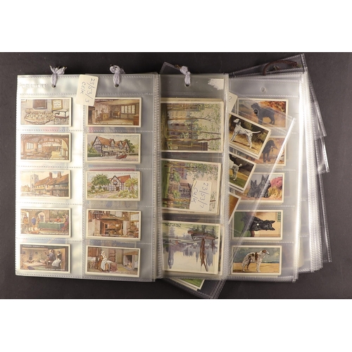 14 - CIGARETTE CARDS ranges in slot in album, further plastic sleeves, and loose in a tin, some stuck dow... 