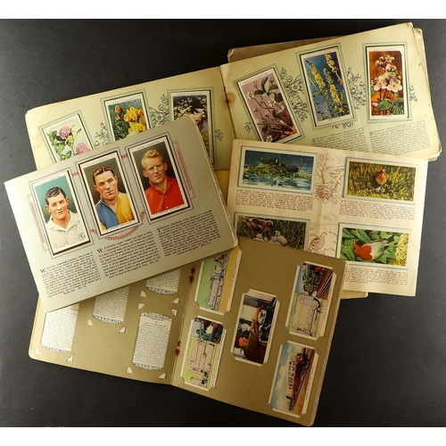 14 - CIGARETTE CARDS ranges in slot in album, further plastic sleeves, and loose in a tin, some stuck dow... 