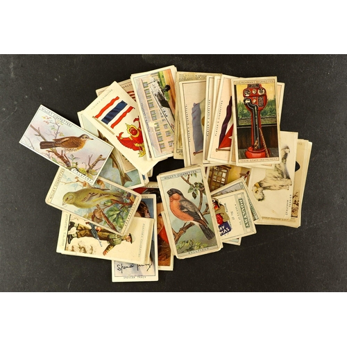 14 - CIGARETTE CARDS ranges in slot in album, further plastic sleeves, and loose in a tin, some stuck dow... 