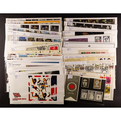 1463 - GB.FIRST DAY COVERS COLLECTION IN THREE ALBUMS AND LOOSE incl. useful definitives, regionals and boo... 