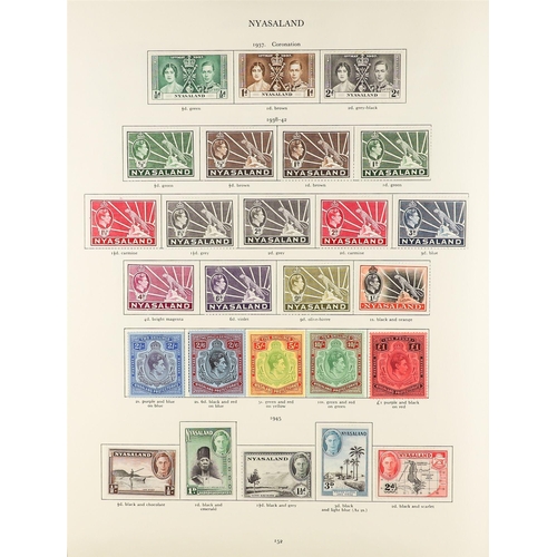 60 - COLLECTIONS & ACCUMULATIONS COMMONWEALTH KGVI CROWN ALBUM with a useful mint and used range, the Ade... 