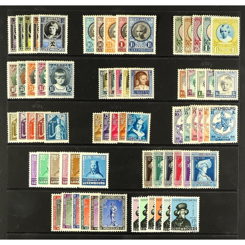 680 - LUXEMBOURG 1926-38 CHILD WELFARE SETS complete run fine mint or NHM. (+/-70 stamps)