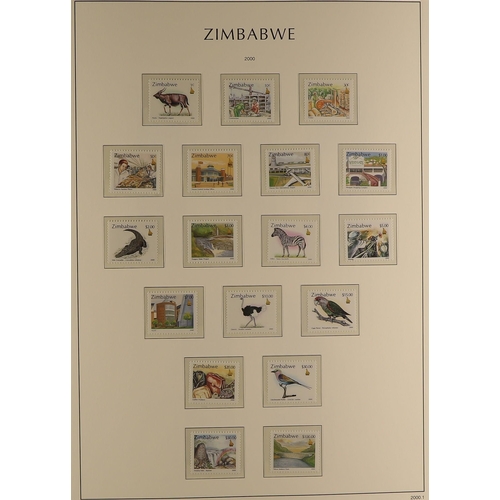 966 - ZIMBABWE 1980-2011 NEVER HINGED MINT COLLECTION in a Lighthouse hingeless album with slip case to 20... 