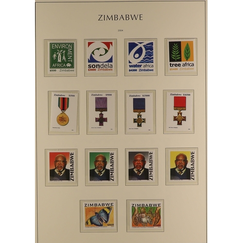 966 - ZIMBABWE 1980-2011 NEVER HINGED MINT COLLECTION in a Lighthouse hingeless album with slip case to 20... 