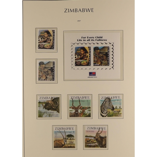 966 - ZIMBABWE 1980-2011 NEVER HINGED MINT COLLECTION in a Lighthouse hingeless album with slip case to 20... 