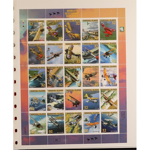 158 - TOPICALS AIRCRAFT & AVIATION 1930's-2010's a never hinged mint world collection in eight albums, all... 