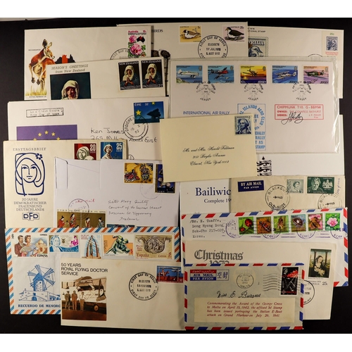 129 - COLLECTIONS & ACCUMULATIONS WORLD COVERS. Modern range of covers and FDCs in albums, binders and loo... 